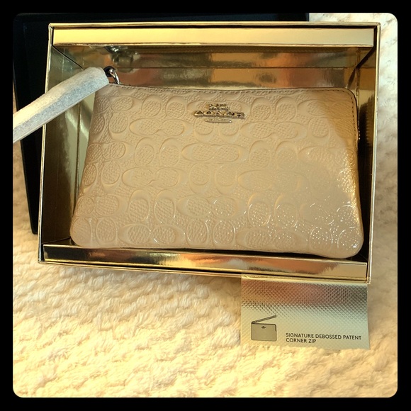 Coach Handbags - Brand new authentic coach wristlet in box